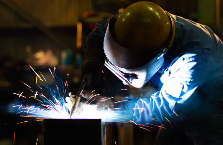 Image of employee welding